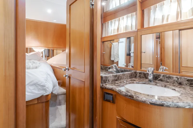 Slide: The Image of Luxurious bathroom and bedroom in 2005 Ocean Alexander 548 Pilothouse yacht. - 46