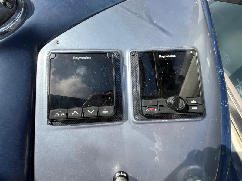 Slide: The Image of Control panel of a 2006 Azimut Atlantis yacht with Raymarine displays. - 16