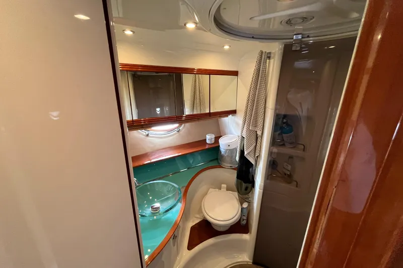 Slide: The Image of 2006 Azimut Atlantis yacht bathroom with modern fixtures and elegant design. - 32