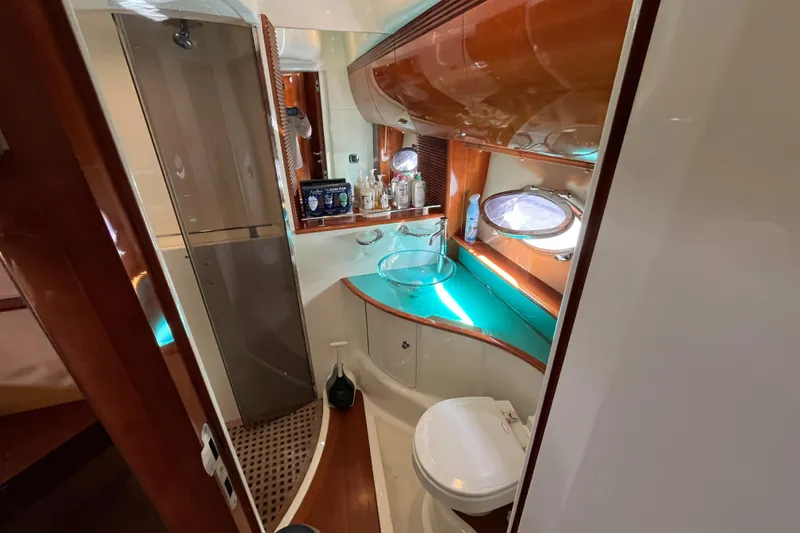Slide: The Image of Luxurious bathroom in 2006 Azimut Atlantis yacht with modern fixtures and elegant design. - 36