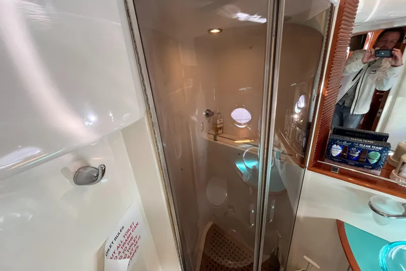 Slide: The Image of 2006 Azimut Atlantis yacht bathroom with shower, mirror, and modern fixtures. - 39
