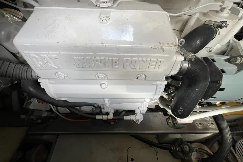 Slide: The Image of Engine compartment of a 2006 Azimut Atlantis yacht with CAT Marine Power. - 44