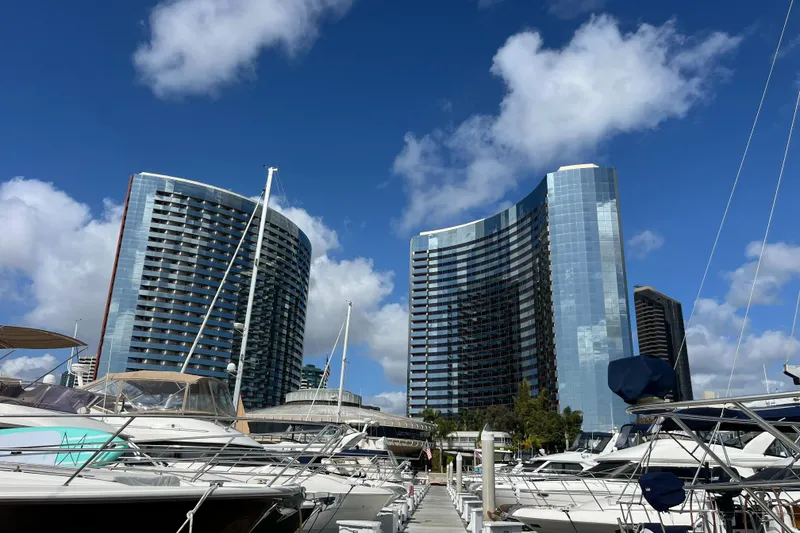 Slide: The Image of Marina with Azimut Atlantis 2006 yachts and modern skyscrapers under a blue sky. - 47