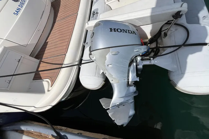 Slide: The Image of Honda outboard motor on 2006 Azimut Atlantis yacht, docked in San Diego. - 8