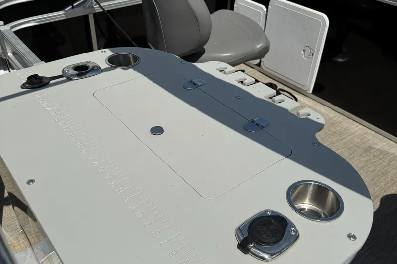 Slide: The Image of 2022 Tahoe Pontoon GT Fish deck with seating and fishing rod holders. - 4