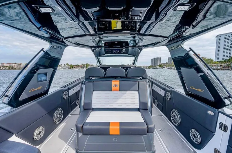 Slide: The Image of 2023 Cigarette 41 Nighthawk boat interior with sleek seating and modern design. - 5