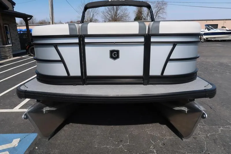 Slide: The Image of 2025 Godfrey Sweetwater 2286 QS pontoon boat, rear view in parking lot. - 10