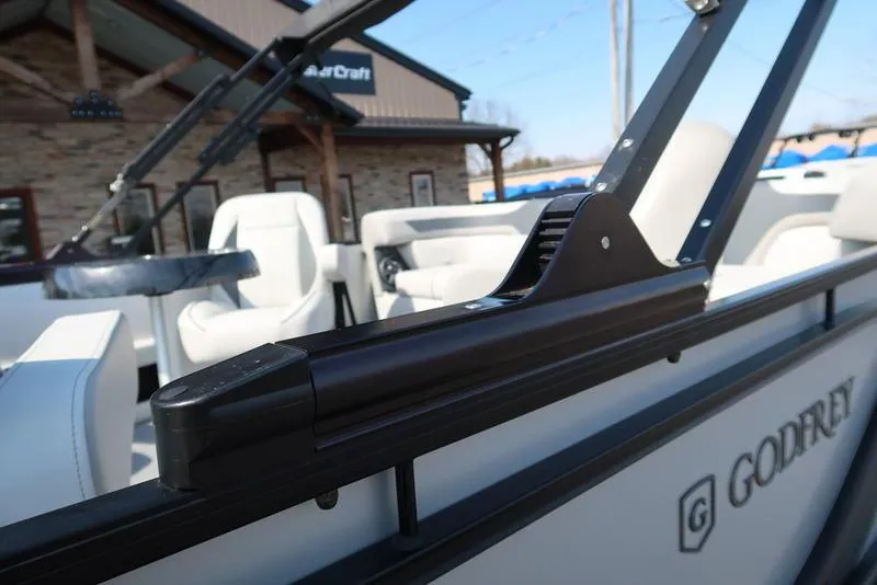 Slide: The Image of 2025 Godfrey Sweetwater 2286 QS pontoon boat with luxurious seating and sleek design. - 14