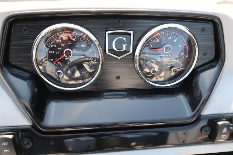 Slide: The Image of Dashboard of 2025 Godfrey Sweetwater 2286 QS with speedometer and tachometer gauges. - 22