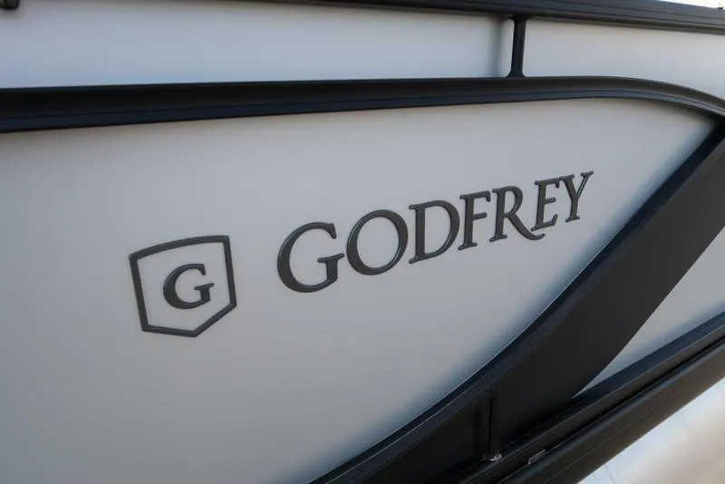 Slide: The Image of 2025 Godfrey Sweetwater 2286 QS boat logo on side panel. - 3