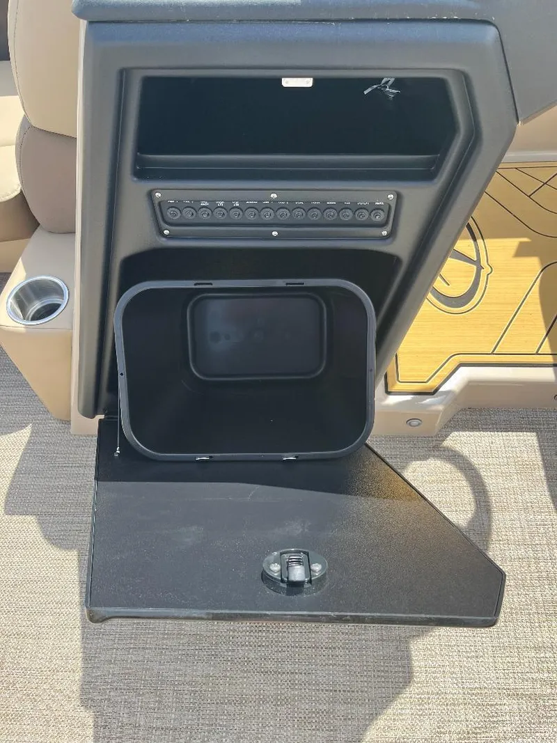 Slide: The Image of Veranda Relax VR22RC 2025 boat console with storage compartment and control panel. - 7