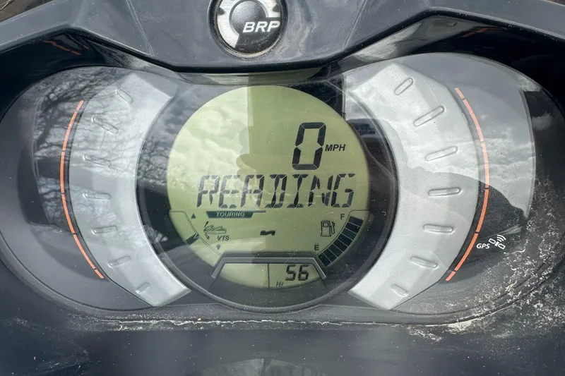 Slide: The Image of Dashboard of a 2013 Sea-Doo GTI SE 130 showing 0 MPH and "READING." - 6