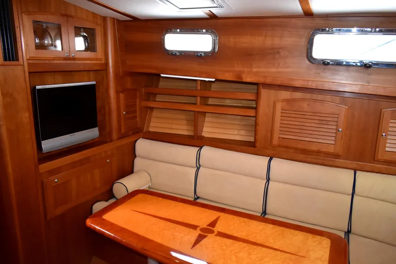 Slide: The Image of Interior of 2007 Sabre 38 Hardtop Express with wood finish and comfortable seating. - 19