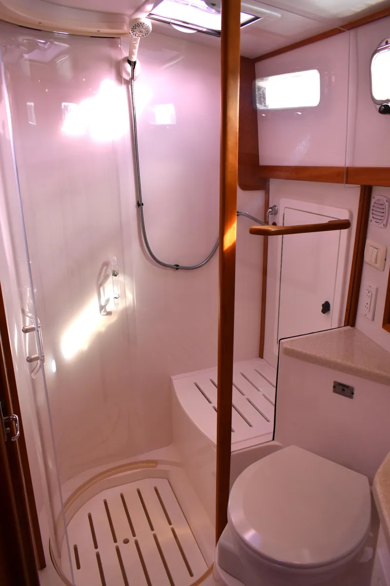 Slide: The Image of 2007 Sabre 38 Hardtop Express yacht bathroom with shower and toilet. - 23