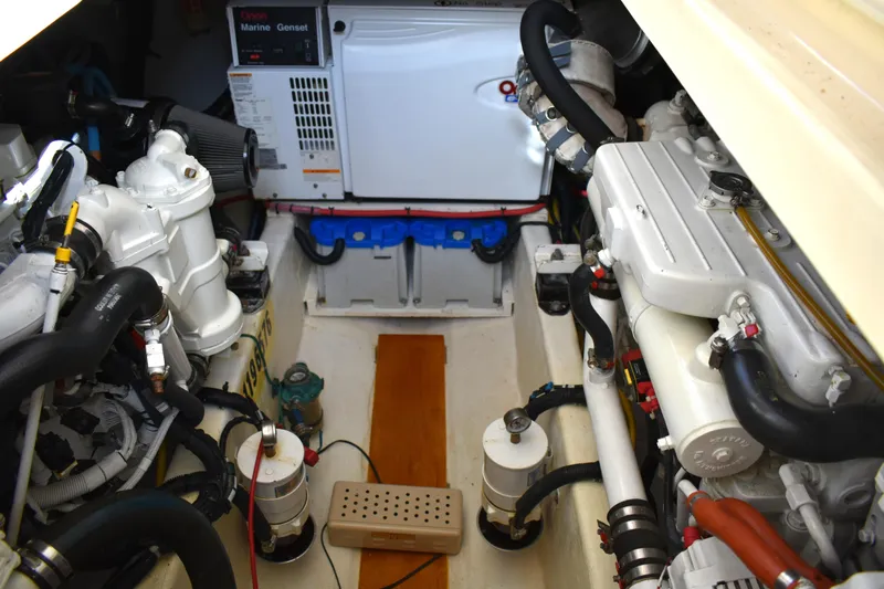 Slide: The Image of Engine room of 2007 Sabre 38 Hardtop Express with visible machinery and components. - 27