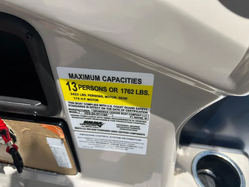 Slide: The Image of 2024 Harris FloteBote Sunliner 230 capacity label, maximum 13 persons or 1762 lbs. - 12