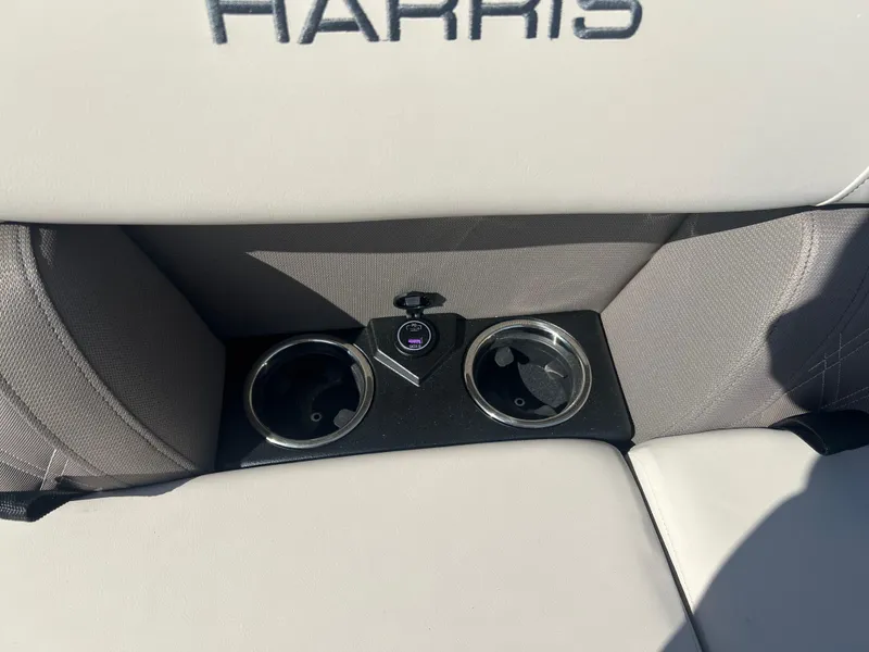 Slide: The Image of 2024 Harris FloteBote Sunliner 230 interior with cup holders and USB port. - 4