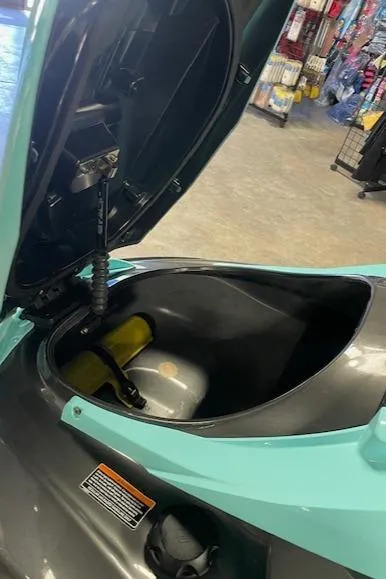 Slide: The Image of 2022 Yamaha WaveRunner FX Cruiser HO storage compartment open in showroom. - 11