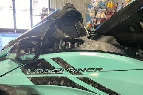 Slide: The Image of 2022 Yamaha WaveRunner FX Cruiser HO in showroom, featuring sleek design and branding. - 6