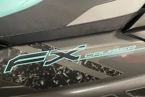 Slide: The Image of 2022 Yamaha WaveRunner FX Cruiser HO logo on sleek black body. - 7
