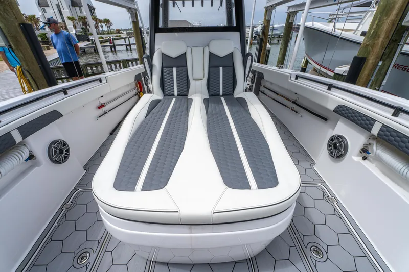 Slide: The Image of 2024 Invincible 33 Catamaran interior with stylish seating and modern design. - 11