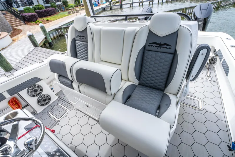 Slide: The Image of 2024 Invincible 33 Catamaran interior with luxurious seating and modern design. - 14