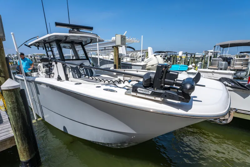 Slide: The Image of 2024 Invincible 33 Catamaran docked at marina, showcasing sleek design and advanced features. - 41