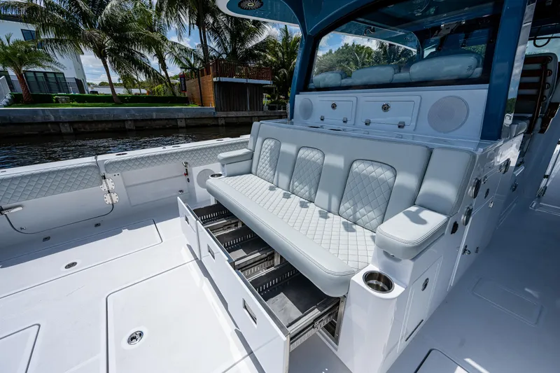 Slide: The Image of Luxurious seating on 2023 HCB 53 Sueños boat with elegant design and spacious layout. - 19