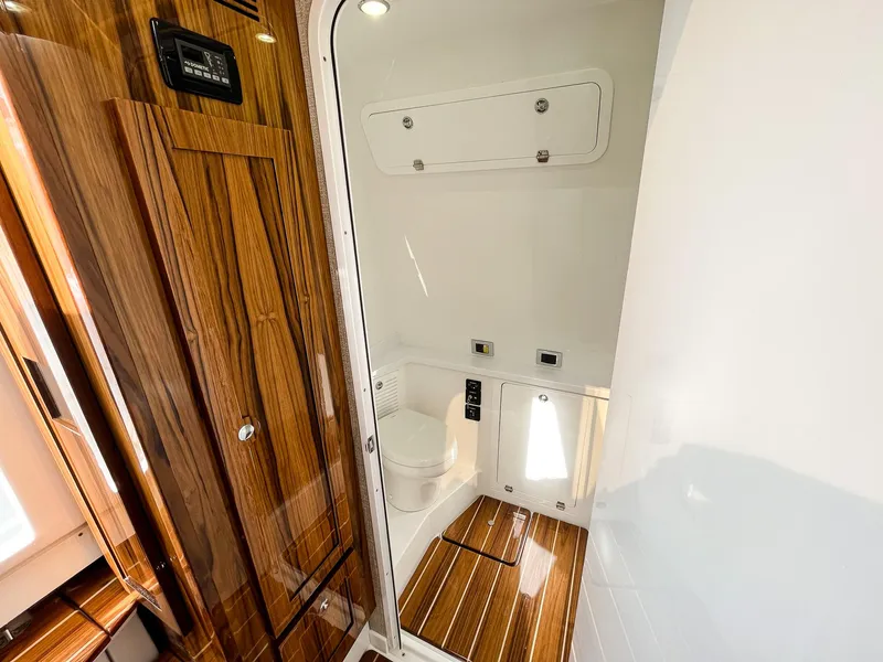 Slide: The Image of Luxurious 2023 HCB 53 Sueños yacht bathroom with wood accents and modern fixtures. - 46