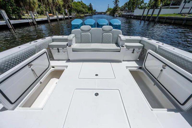 Slide: The Image of 2023 HCB 53 Sueños boat deck with seating and storage compartments. - 9
