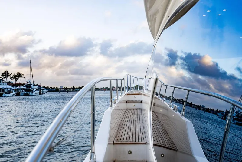 Slide: The Image of Azimut 70 Fly 2011 yacht on water, reflecting sky and clouds. - 25
