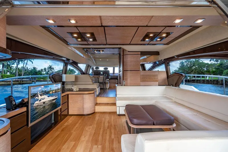 Slide: The Image of Luxurious interior of 2011 Azimut 70 Fly yacht with modern design and spacious seating. - 27