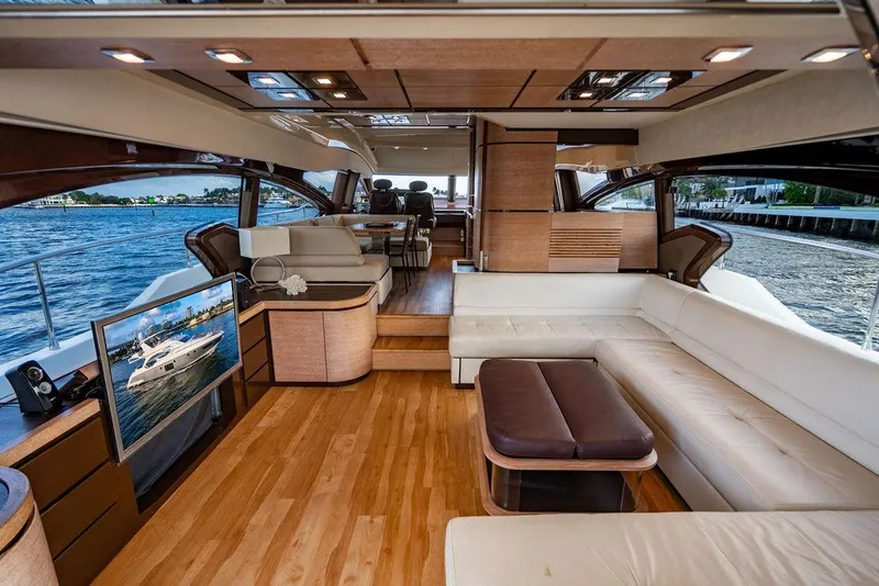 Slide: The Image of Luxurious interior of 2011 Azimut 70 Fly yacht with elegant seating and scenic water views. - 3