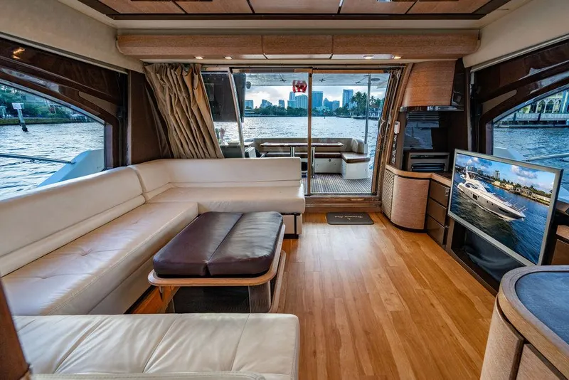 Slide: The Image of Luxurious interior of 2011 Azimut 70 Fly yacht with city skyline view. - 31