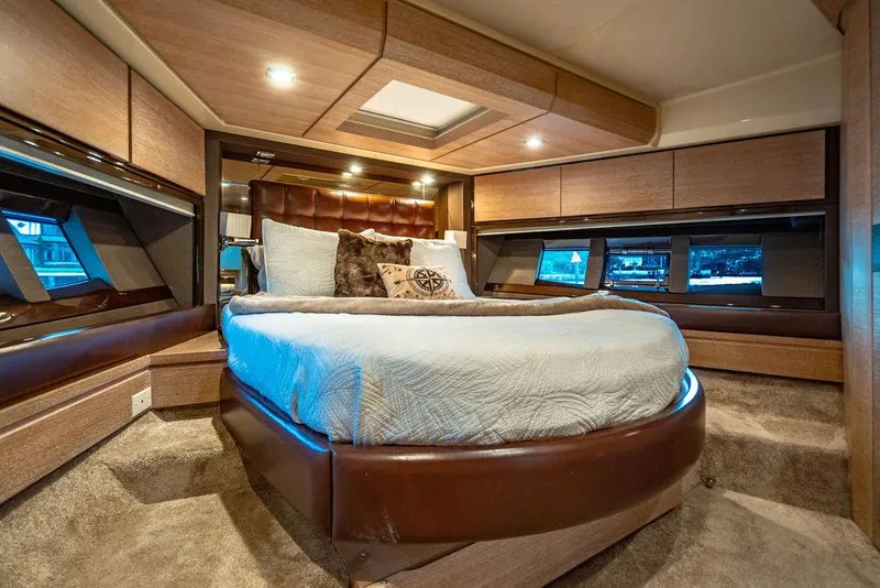 Slide: The Image of Luxurious bedroom interior of 2011 Azimut 70 Fly yacht with modern design and ambient lighting. - 49
