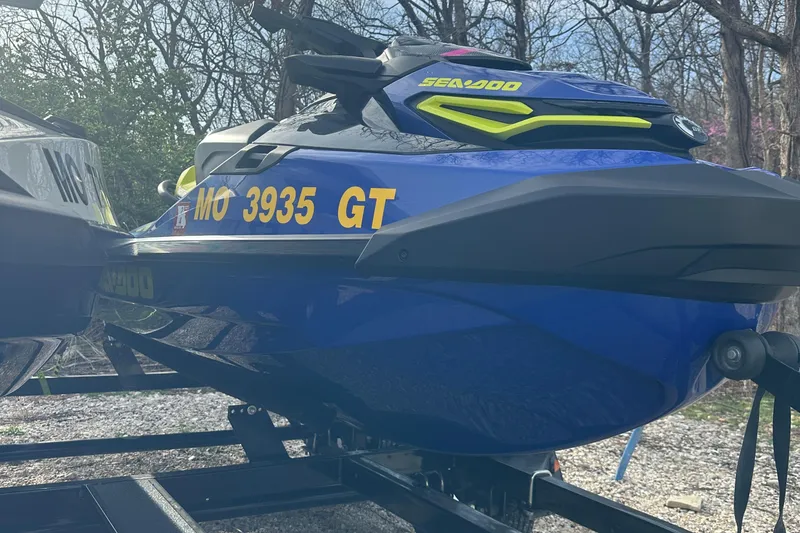 Slide: The Image of 2021 Sea-Doo Wake Pro 230 jet ski on trailer, blue with yellow accents. - 11