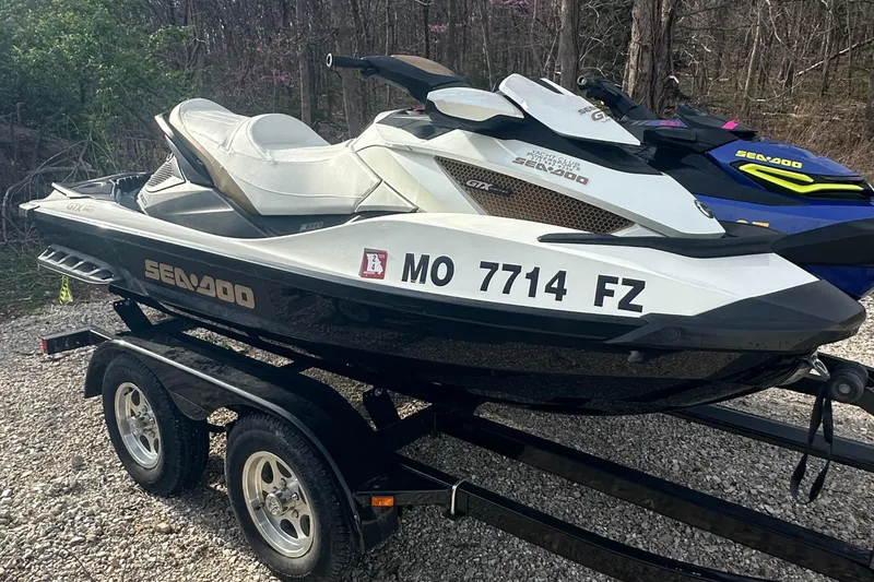 Slide: The Image of 2021 Sea-Doo Wake Pro 230 on trailer, parked outdoors. - 20