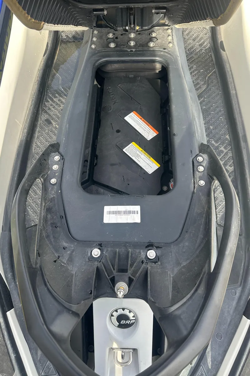 Slide: The Image of 2021 Sea-Doo Wake Pro 230 storage compartment, open view, showcasing interior details. - 26