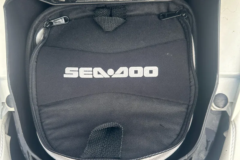 Slide: The Image of Sea-Doo Wake Pro 230 storage compartment with branded cover, 2021 model. - 29