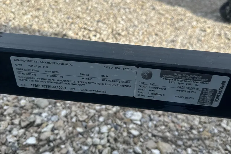 Slide: The Image of Label on 2021 Sea-Doo Wake Pro 230 trailer, displaying manufacturing and safety information. - 32
