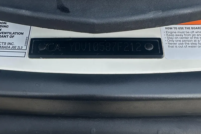 Slide: The Image of 2021 Sea-Doo Wake Pro 230 identification plate with safety instructions. - 34