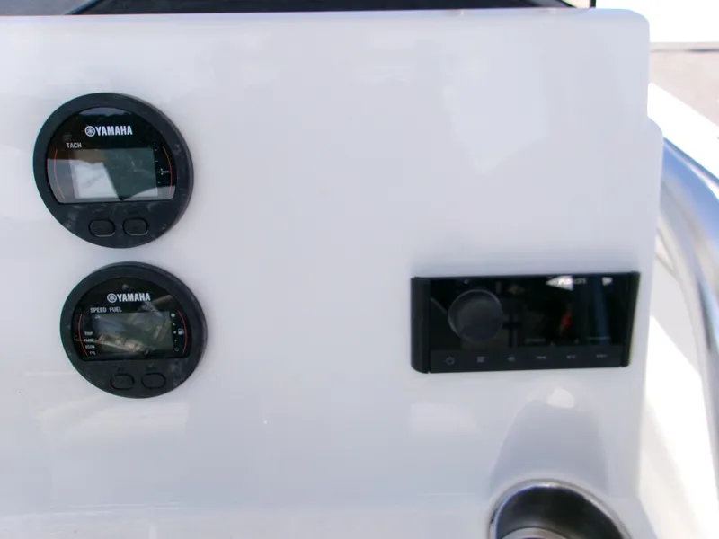 Slide: The Image of Control panel of 2025 Key West 203 FS boat with Yamaha gauges. - 12