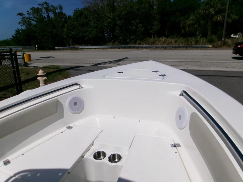 Slide: The Image of 2025 Key West 203 FS boat interior with speakers and cup holders. - 14