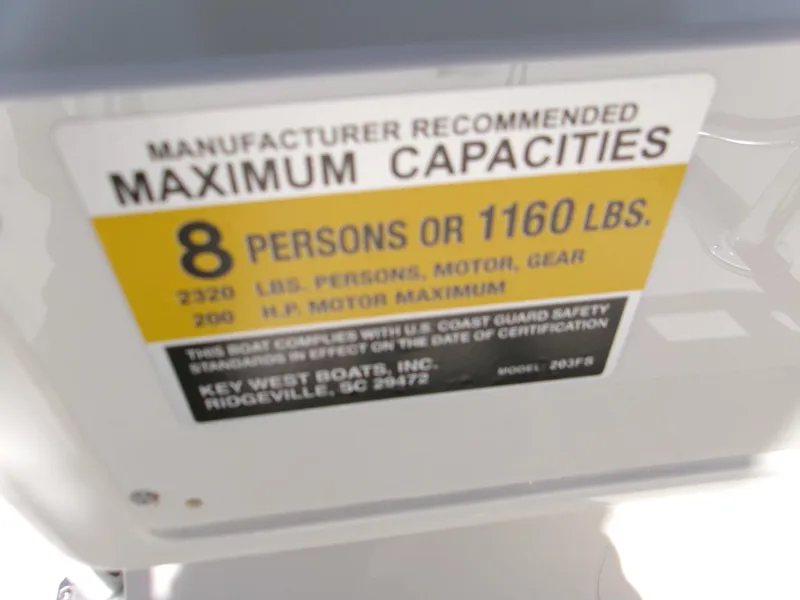 Slide: The Image of Maximum capacity label for Key West 203 FS boat, 2025 model, 8 persons or 1160 lbs. - 19
