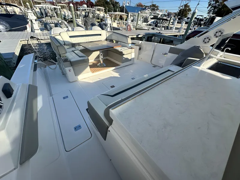 Slide: The Image of 2022 Tiara Yachts 43 LS luxury boat interior with spacious seating and modern design. - 30