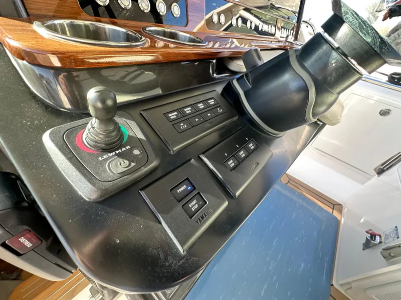 Slide: The Image of Control panel of 2022 Tiara Yachts 43 LS with joystick and buttons. - 39