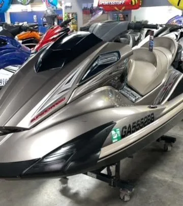 Slide: The Image of 2011 Yamaha WaveRunner FX Cruiser SHO in showroom, sleek design, metallic finish. - 3