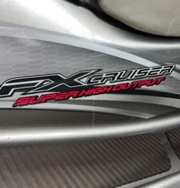 Slide: The Image of 2011 Yamaha WaveRunner FX Cruiser SHO logo on a sleek silver body. - 7