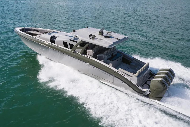 Slide: The Image of 2025 Midnight Express 52' Vitesse yacht cruising on open water. - 2