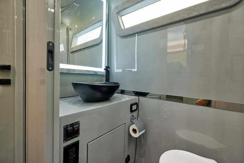 Slide: The Image of Modern bathroom interior in 2025 Midnight Express 52' Vitesse yacht. - 26